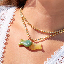 Load image into Gallery viewer, Carved Stone Gold Fish Pendants in carved stone by Christina Puchi