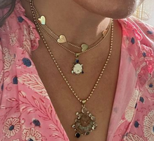 Load image into Gallery viewer, Blue Halo Lions Paw Pendant in shell by Christina Puchi