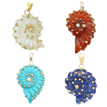 Load image into Gallery viewer, Carved Stone Ammonite Pendants in carved stone and shell by Christina Puchi