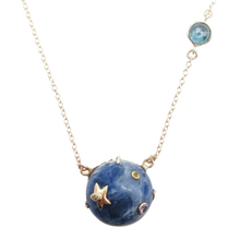 Load image into Gallery viewer, Carved Stone Planet Necklace in carved stone and gold by Christina Puchi