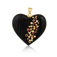 Load image into Gallery viewer, Ebony + Ruby Heart Pendant in carved wood by Christina Puchi