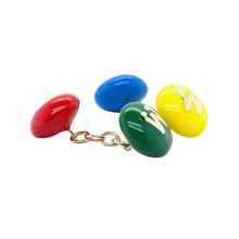 Load image into Gallery viewer, Candy Letter Cufflinks in gold by Christina Puchi