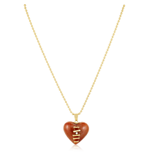 Load image into Gallery viewer, Carved Stone Stitched Heart Pendants in carved stone by Christina Puchi
