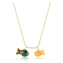 Load image into Gallery viewer, Carved Stone Gold Fish Pendants in carved stone by Christina Puchi
