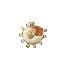Load image into Gallery viewer, Spiral Shell Halo Pendant in shell by Christina Puchi
