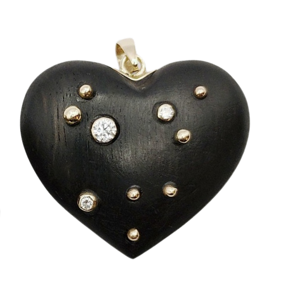 Carved Ebony Studded Heart Pendant in carved wood by Christina Puchi