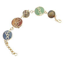 Load image into Gallery viewer, Carved Stone Planet Bracelet in carved stone by Christina Puchi
