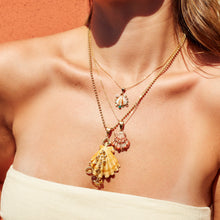 Load image into Gallery viewer, Barnacle Yellow Lion’s Paw Pendant in shell by Christina Puchi
