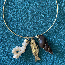 Load image into Gallery viewer, Wooden Spiral Shell Pendant in carved wood and shell by Christina Puchi
