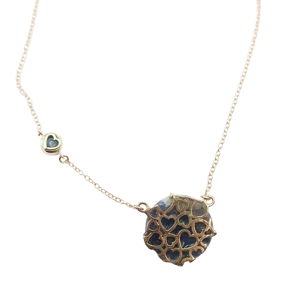 Carved Stone Planet Necklace in carved stone and gold by Christina Puchi