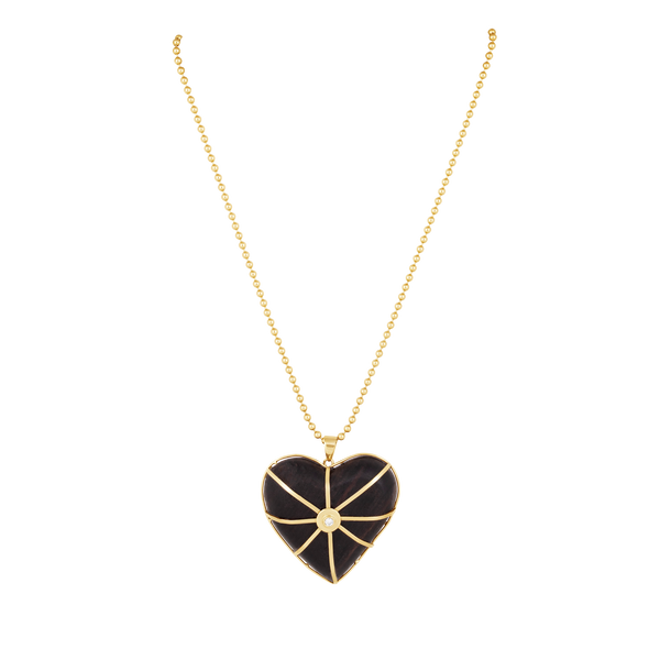 Carved Ebony Heart in carved wood by Christina Puchi