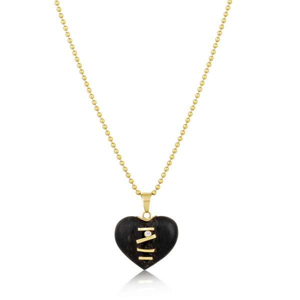 Carved Ebony Stitched Heart Pendant in carved wood by Christina Puchi