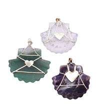 Load image into Gallery viewer, Carved Amethyst Shell Pendant in carved stone and shell by Christina Puchi
