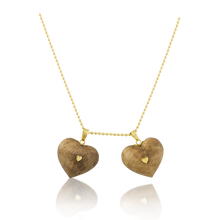 Load image into Gallery viewer, Walnut Studded Heart Pendant in carved wood by Christina Puchi
