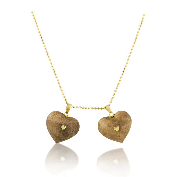 Walnut Studded Heart Pendant in carved wood by Christina Puchi