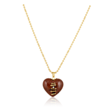 Load image into Gallery viewer, Carved Stone Stitched Heart Pendants in carved stone by Christina Puchi
