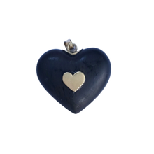 Load image into Gallery viewer, Carved Ebony Studded Heart Pendant in carved wood by Christina Puchi
